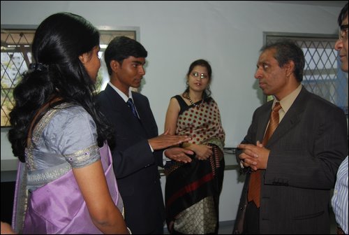 Dr Bodha Welsly is briefed about the latest research work done in tha Skin regeneration Lab. Of.JPG