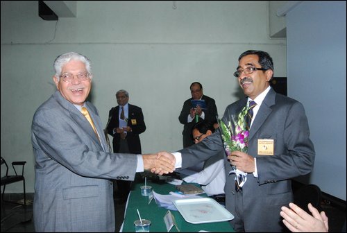 Mr  Nand Cwala receiving token of appreciation.JPG