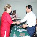 Mrs Shroff presenting gift to guest of honour Mr. Vijay Nahata (Municipal commissioner,Navi Mumbai.).JPG