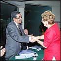 President of Indian Burns Research Society Mrs Shroffff givng token of gft to  Dg TN Subramaniam (Rotary Dist 3140).JPG